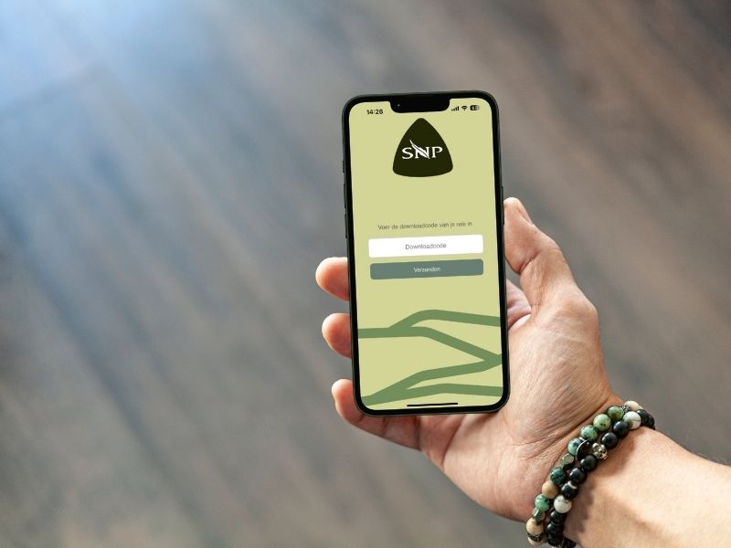 SNP Reis App Inlogscherm met downloadcode